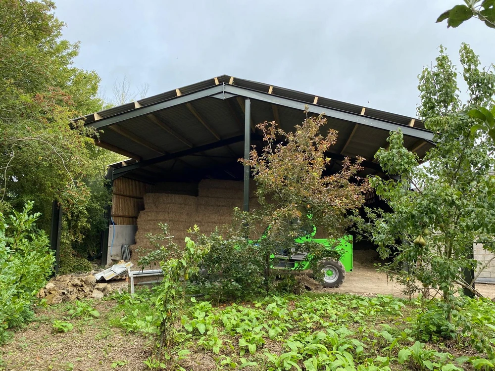 Agricultural Buildings - Farm Buildings in Gloucestershire by DFC Steel Construction. Shown here: 1 bay extension - Hay Store - attached to main farm building -Wiltshire, Minety -DFC Steel Construction.
